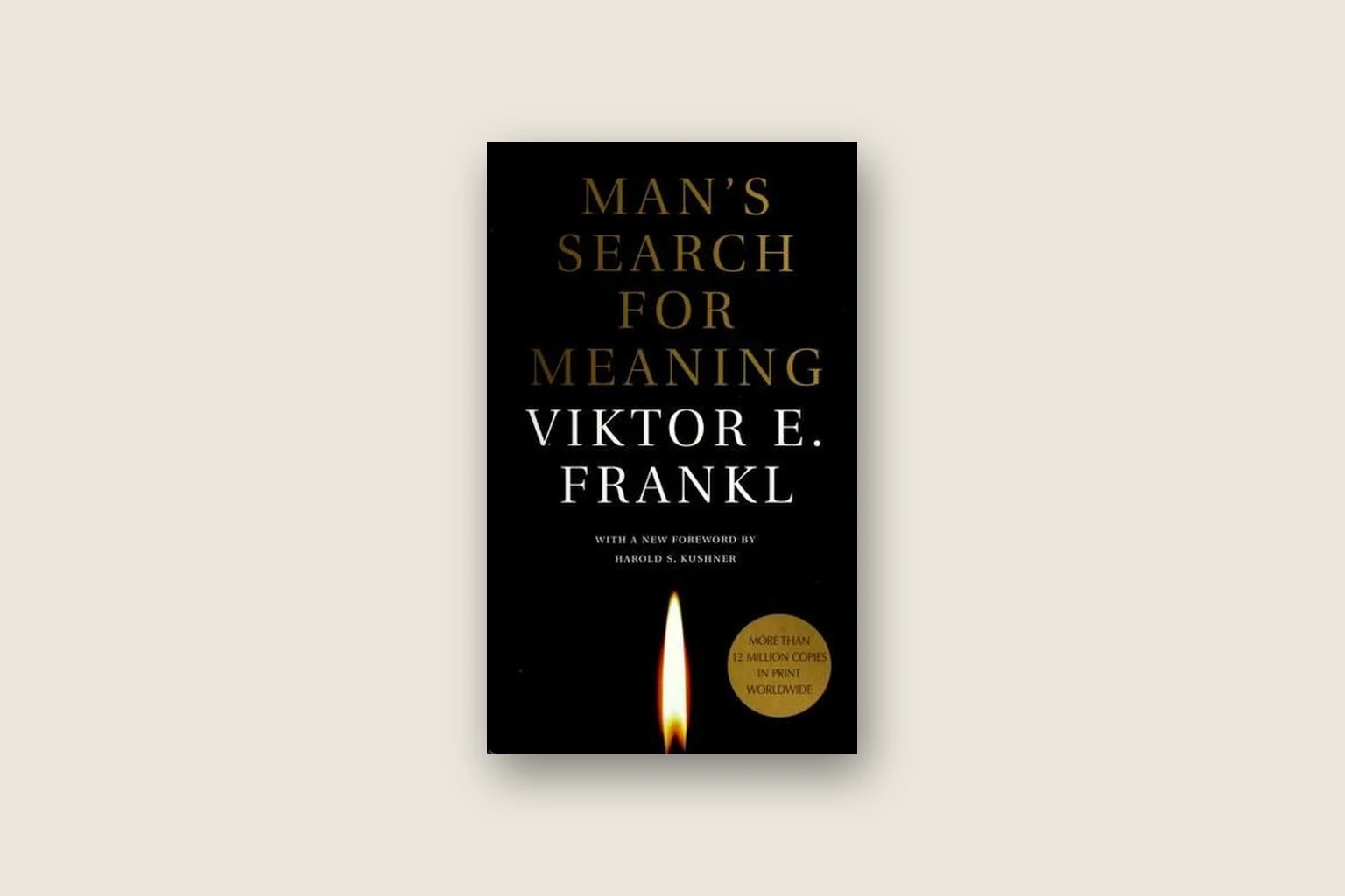 The cover of Man's Search for Meaning by Viktor E. Frankl: a black cover with a candle flame at the bottom